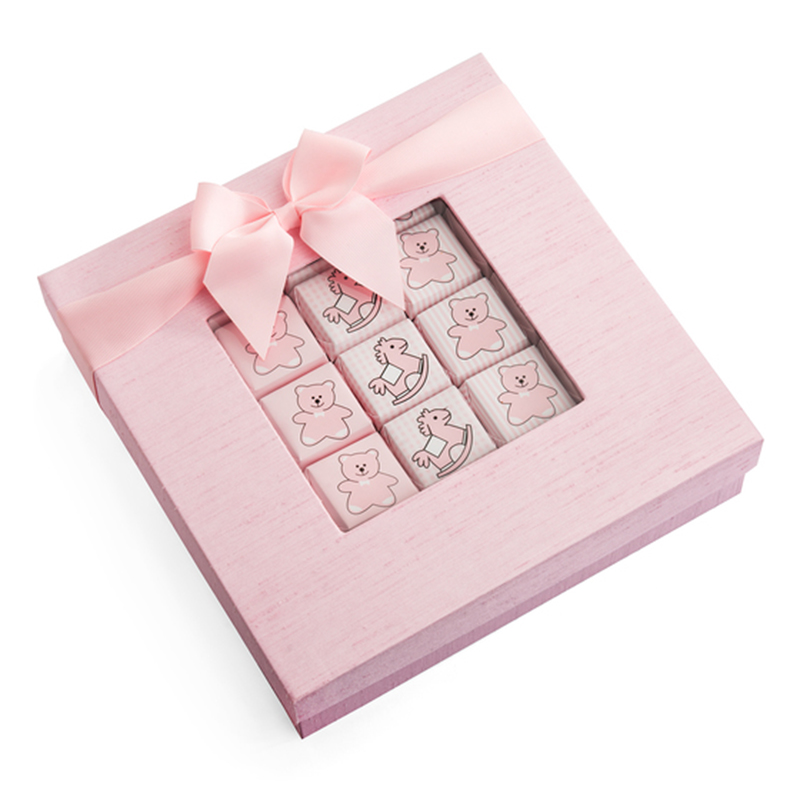 Caja de papel caramelo rosa con cinta