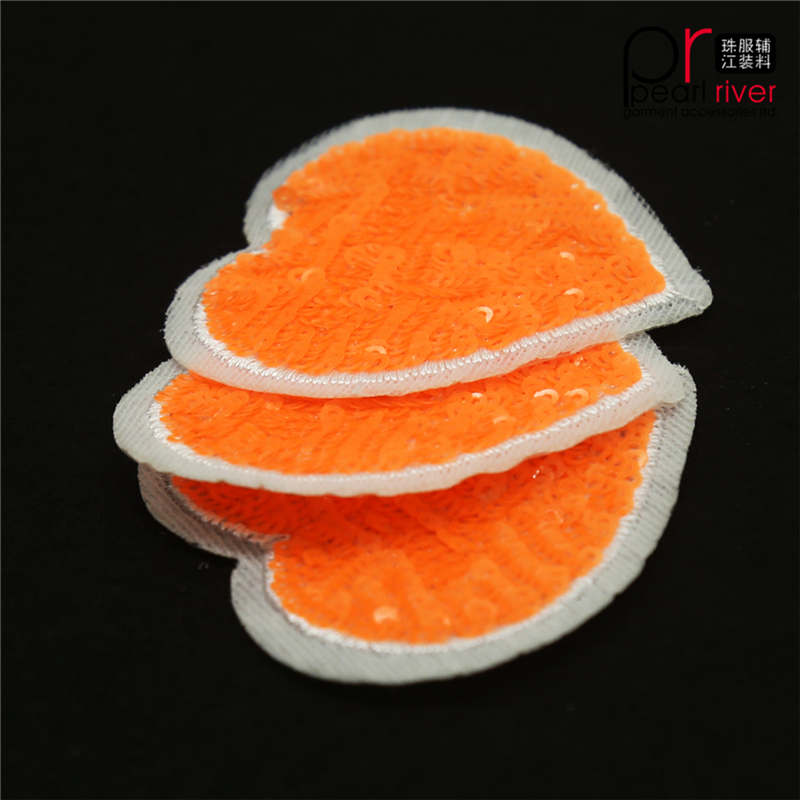 Parche de lentejuelas en forma de corazón naranja