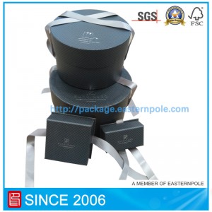 Caja de chocolate redonda de lujo con cierre de cinta.