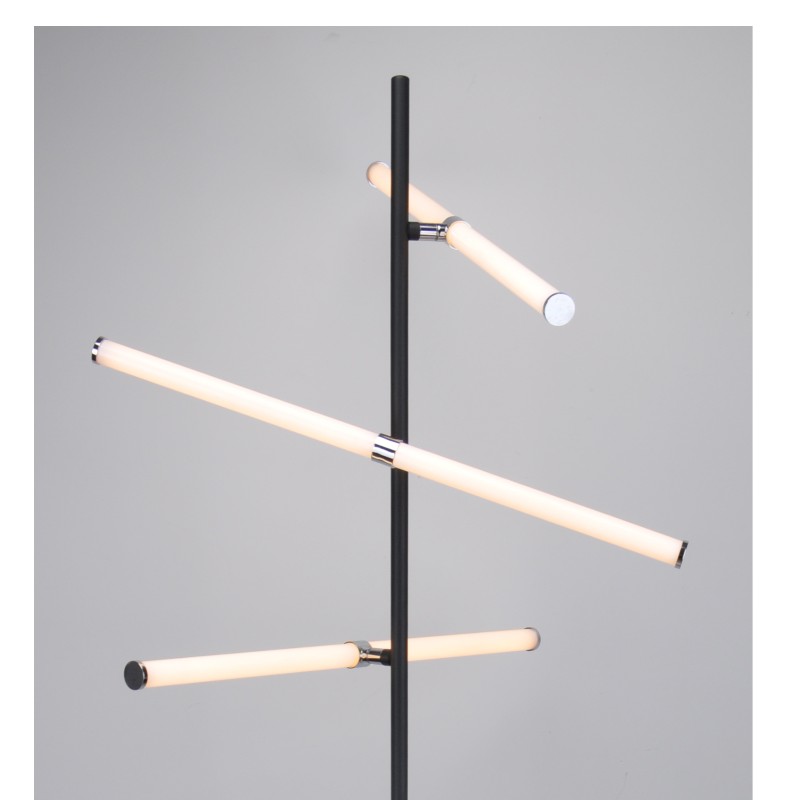 Luz LED en el suelo, con tres tubos acústicos rotatorios.