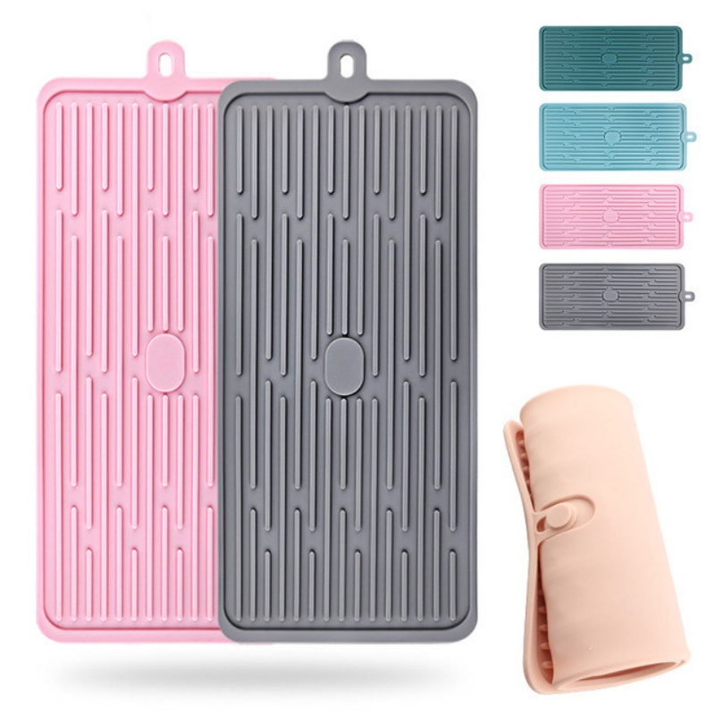 Botón rectangular para sujetar la almohadilla de drenaje