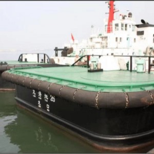 Remolcadores, muelles de caucho y retardadores de dique