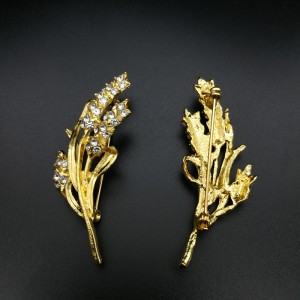Broche de oro de trigo