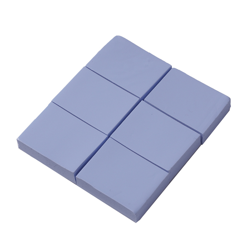 Suministro de láminas de silicona conductora térmica azul, hoja de silicona de chip de absorción de golpes, disipador de calor eléctrico y eléctrico