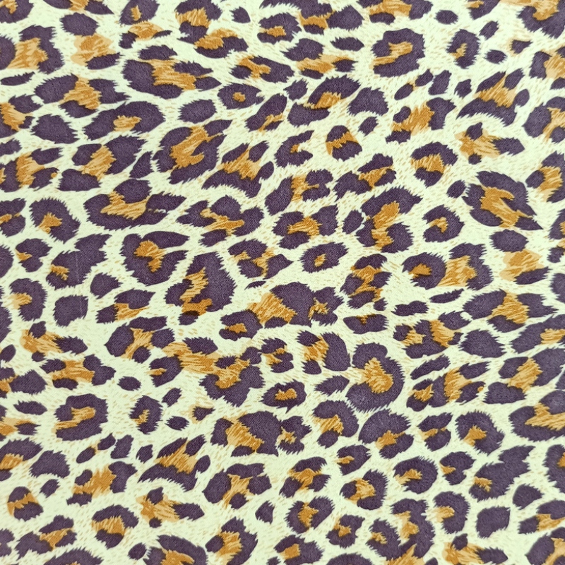 Recicle la impresión de leopardo de poliéster.