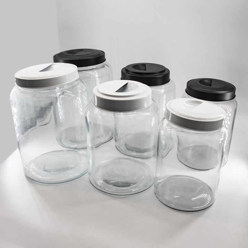Venta al por mayor de almacenamiento de vidrio de almacenamiento de frascos con tapas metálicas para la cocina