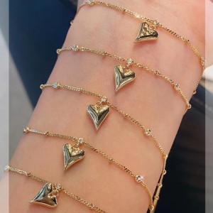 Pulsera de corazón de oro de 18k y tobillera