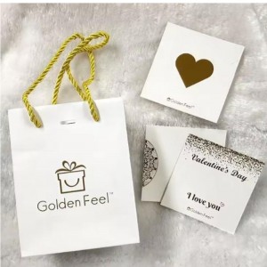 Bolsas de papel de compras pequeñas de lujo impresas de lujo connombre denegocio para el empaque de joyas con el mango