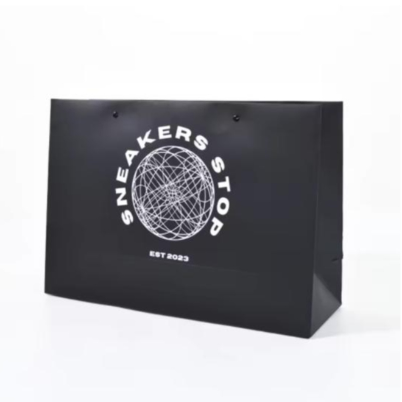 Logotipo personalizado Matt Black Paper Papelaje Bolsa de papel de regalo bolsas de compras Bolsas de papel de lujo con mango de cinta