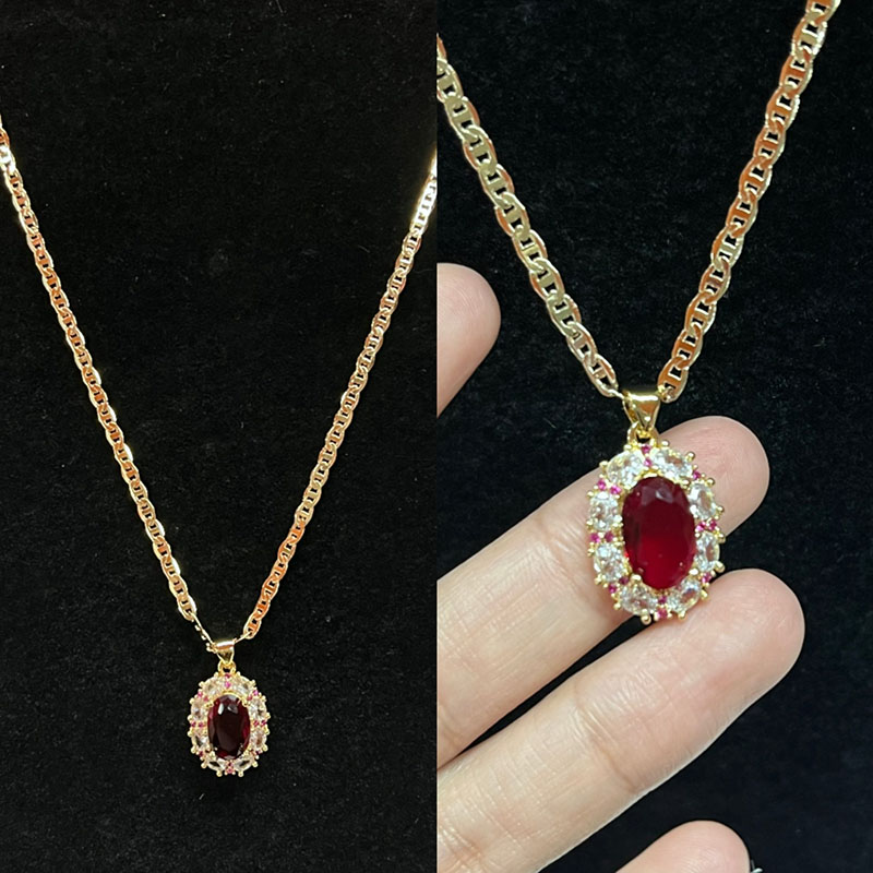 Collar Royal Ruby Halo con diamante & Acentos de zafiro rosa en una cadena de oro de 14k