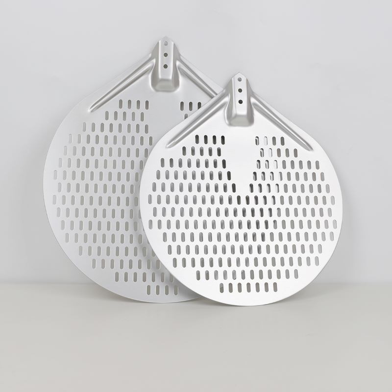 1671508701.jpg Perforated round pizza paddle.jpg